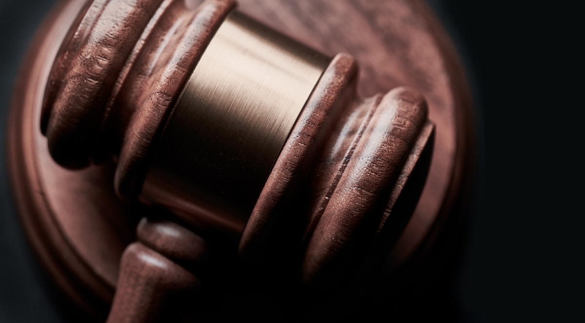 Judge's gavel on a dark background